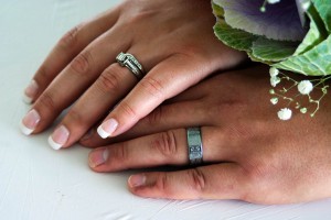 married hands with rings